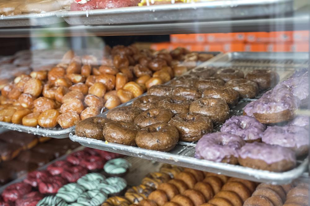 Display of colorful donuts at Original House of Donuts.