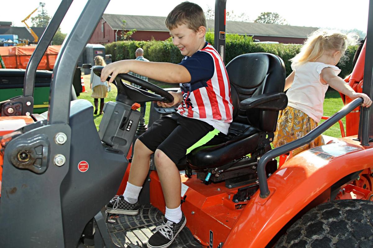 Child Riding Tractor